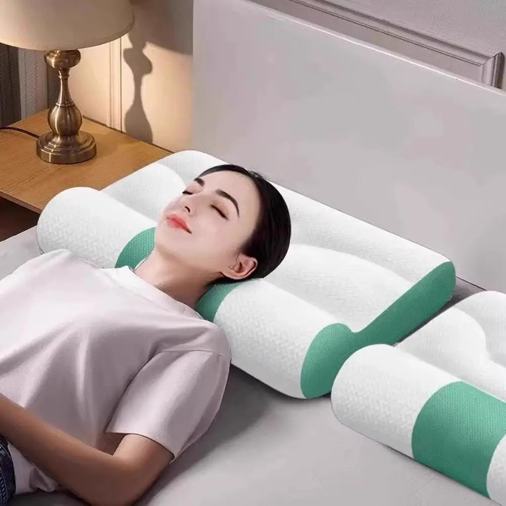 Coussin cervical ergonomique vert lit