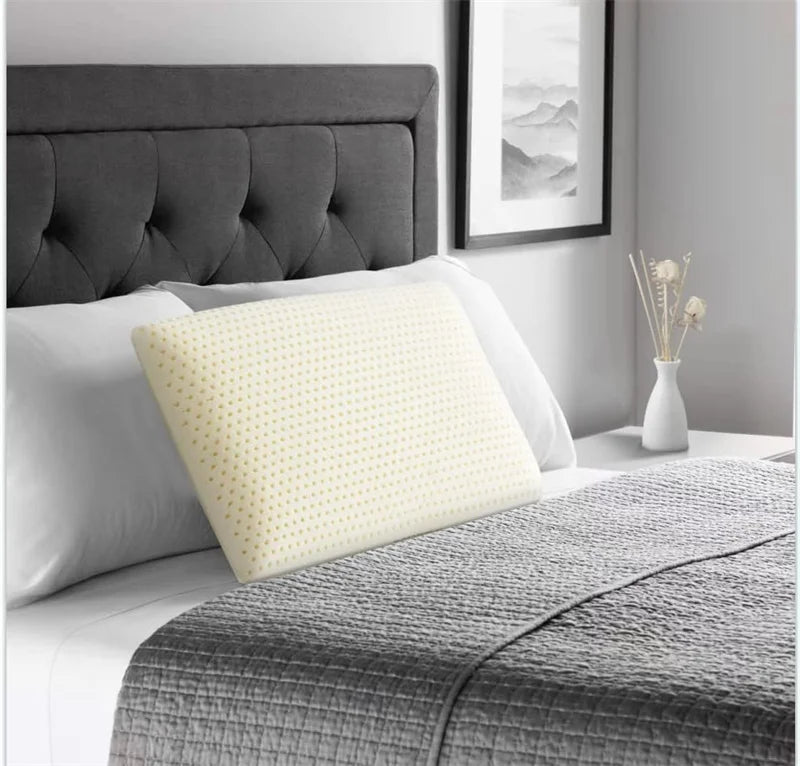 Oreiller ergonomique pour douleurs cervicales lit